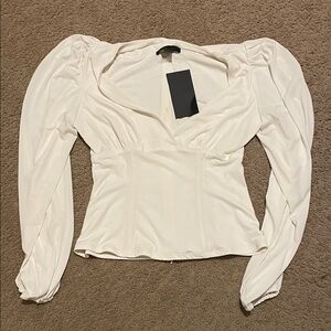 La femme en nior bishop top white